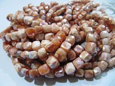 a pile of beads sitting on top of a table