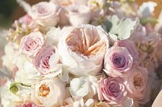 a bridal bouquet with pink and white flowers