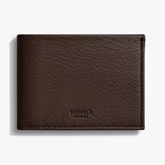 Built from premium Signature leather, our Slim Bifold wallet includes a unique, leather-lined cash pocket, and six faille-lined credit card pockets. Marked by folded edges and pared-down simplicity, this leather piece will gain natural character through daily use. Classic Bifold Wallet With Coin Pocket, Classic Trifold Wallet With Leather Lining For Travel, Classic Leather Wallet With Leather Lining, Business Leather Trifold Wallet, Leather Trifold Business Wallet, Business Leather Wallet With Coin Pocket, Leather Business Wallet With Coin Pocket, Classic Leather Wallets With Smooth Grain, Brown Textured Leather Business Wallet