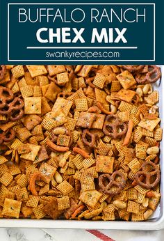 a casserole dish with chex mix in it and text overlay that reads buffalo ranch chex mix