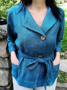 "Handmade 100% linen blazer with pockets and belt. Made with love for You. *100% local medium weight linen *Each item is individually cut and sewn by order *The model is wearing size L, blazer color - Turquoise blue *Note that colors may look different on your display depending on their settings and technical characteristics. Please let us know if you need different measurements or colors. CARE *Machine wash up to 40 / 104F gentle cycle *Iron inside out at medium high *Do not bleach *Do not tumb Kimono Blazer, Kimono Online, Belt Kimono, Mid Calf Skirt, Linen Cardigan, Buy Linen, Mid Calf Dresses, Linen Jackets, Linen Jacket