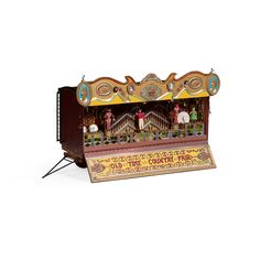 an old fashioned musical box with horses on the front and sides, sitting on a white background