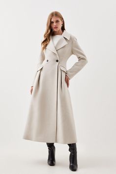 The New By Lydia: A Moment In Paris Collection Covers Every Dress Code For The Party Season, Featuring Unique Investment Pieces That Have A Modern Yet Timeless Feel.Crafted From Sumptuous Italian Wool, This Premium Double-Breasted Coat Ensures Warmth And Style. Notched Lapels Exude Classic Appeal, While Flap Pockets Add Practicality. A Full-Skirted Design Creates A Flattering Silhouette.Italian Woolnotched Lapelsdouble-Breasted Buttonsflap Pocketsfull-Skirted Design Elegant A-line Outerwear For Work, Elegant A-line Formal Outerwear, Elegant Tailored A-line Outerwear, Elegant A-line Outerwear With Button Closure, Elegant A-line Outerwear With Buttons, Fitted A-line Party Outerwear, A-line Outerwear For Winter Party, A-line Winter Outerwear For Party, Elegant A-line Outerwear For Party