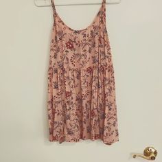 Super Lightweight, Adjustable Spaghetti Strap Top. Never Worn. Gorgeous Pink Background With Darker Pink, Black, And Gray Floral Pattern. Wide, Tiered Style. Super Cute Criss Cross Back Detail (Last Picture) Shoulder To Hem 32 Inches As Pictured (Longer If Straps Are Let Out) Pink Floral Print Tank Top For Day Out, Pink Floral Print Spaghetti Strap Top, Pink V-neck Top With Adjustable Straps, Pink Camisole For Summer Beach Outings, Pink Flowy Sleeveless Top, Casual Pink Tank Top With Floral Print, Casual Pink Floral Print Tank Top, Pink Summer Beach Camisole, Pink Summer Vacation Camisole