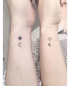 two people with matching tattoos on their arms