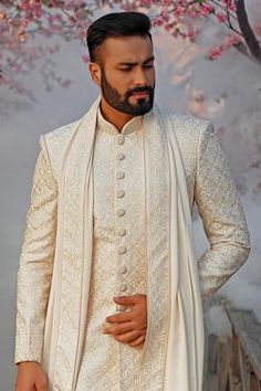 Shop for Vanshik White Raw Silk Embroidered Sherwani Set for Men Online at Aza Fashions Cream Raw Silk Sherwani With Dupatta, Unstitched Cream Sherwani With Dupatta, Cream Sherwani With Dupatta For Festivals, Fitted White Jamawar Dupatta, Cream Bandhgala With Dupatta For Festivals, Off White Bandhgala With Dupatta For Eid, Unstitched Cream Sherwani With Traditional Drape, Off White Sherwani With Resham Embroidery For Diwali, Semi-stitched Cream Sherwani With Dupatta