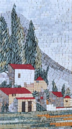 this is an image of a mosaic with mountains in the back ground and houses on it