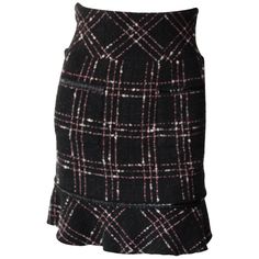 Chanel High-Waisted Black, White and Pink Plaid Skirt Plaid and tweed mini skirt. High waisted fit with ruffle at the bottom. Very "Cher" from Clueless vibes. Silk Lined. Zipper in the back. Size 34 Pink Plaid Skirt, Chanel Skirt, White Maxi Skirts, Wool Mini Skirt, Boucle Jacket, Tweed Mini Skirt, Black Tweed, Vintage Rock, Black White Pink