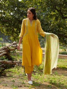 Kurta with pretty Dori embroidery, print dupatta & pants Fabric: Handwoven Mal Cotton Silk Color: Yellow Embroidery Details: Thread embroidery Note: Wash Care - Dry clean only The product will be shipped within 20-25 days of order placed Measurement: Kurta / Dress / Top Standard Body Measurement ( in Inch) Size Bust Waist Hip Shoulder Armhole Sleeve Length XS 34 32 36 14 16.5 16 46 S 36 34 38 14 17 16 46 M 38 36 40 15 17.5 16 46 L 40 38 42 15.5 18.5 16 46 XL 42 40 44 16 19.5 16 46 XXL 44 42 46 1