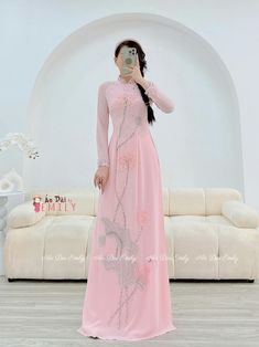 🌻Material: chiffon. 🌻Stretchy level: 3/10 This set includes: 1 ao dai top and 1 pants 🌻 The measurement of this ao dai (long dress) is in Vietnamese size (American size tends to be bigger for the same size). Please LOOK AT THE SIZE CHART CAREFULLY BEFORE ORDERING. There might have some chalk writings on the fabric due to making process. These marks can be washed away easily. 🌻🌻No returns or exchanges Buyer can contact seller about any issues with an order. 🌸 Follow us Facebook/aodaiemily www.aodaiemily.com 💜 Thank you very much!💜 Pink Fitted Chiffon Sets, Fitted Pink Chiffon Set, Elegant Georgette Dress For Celebration, Pink Long Ao Dai For Wedding, Long Pink Ao Dai For Wedding, Elegant Georgette Sets For Celebration, Elegant Pink Sets For Celebrations, Elegant Long Dresses For Celebration, Elegant Spring Celebration Sets