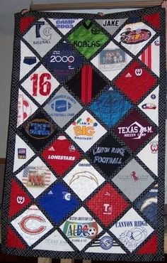 a quilt made to look like it has many different logos on it