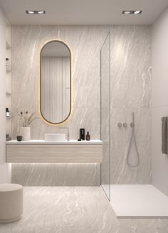 a modern bathroom with marble walls and floor