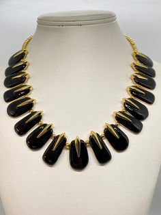 "Lovely Signed Joan Rivers Black Enameled & Gold Necklace. *  Measures an adjustable 18-19\".  *  Signed - Joan Rivers *  Condition: pre-owned / Like New. Visit our shop for even more Vintage Estate Jewelry & unique finds.  Shipping: Items will be shipped within 3 business days after we receive payment. We take care in our packaging to ensure safe arrival. We do ship internationally.  Please NOTE: ALL PRE-OWNED PIECES ARE SOLD AS IS. When purchasing vintage jewelry. Please be careful when unwrap Joan Rivers Jewelry, Bali Jewelry, Pink Tourmaline Ring, Joan Rivers, Gold Enamel, Wedding Jewellery Necklace, Amethyst Ring, Black Enamel, Pink Tourmaline