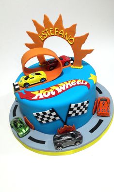 a birthday cake with cars on it