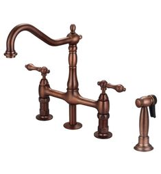 an antique style faucet with two sprayers