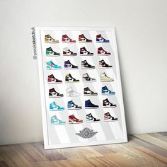 a poster with many pairs of shoes on it in front of a white wall and wooden floor