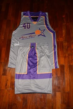 a basketball jersey is laying on the floor