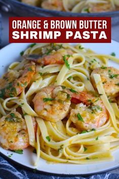 orange and brown butter shrimp pasta on a white plate