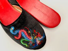 An intricated design of phoenix symbolizes rising from ashes through the fire and rebirth through the cycle of transformation. The vibrant colors of embroidery resemble the strength and power of phoenix and matching your desire of always being difference. Almond toe with padded soles for adding comfort. They are crafted from butter-soft leather lining and insole. Outsole is leather in soft brushed handfeel. Narrow fit with low heel for extra elegance. You can pair with your favorite jeans for a Luxury Slippers, Velvet Mules, Wedding Slippers, Velvet Slippers, Wedding Flats, Gifts Wedding, Bridal Shower Gifts, Shower Gifts, Favorite Jeans