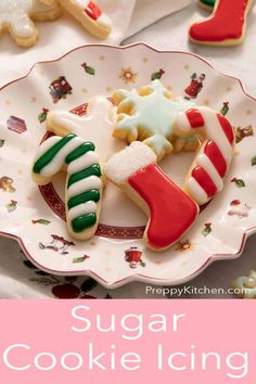 sugar cookie icing on a plate with candy canes