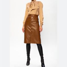 Women’s 2xn By Nancy Brown Faux Leather Skirt With Zip Up Back, Has Matching Belt Below The Knee Length #5080 New Without Tags 51%Cotton 35%Viscose 14%Nylon Solid Color Skirt For Night Out In Fall, Solid Skirt For Night Out In Fall, Solid Color Skirt For Fall Night Out, Solid Skirt For Fall Night Out, Brown Pencil Skirt For Fall Party, Fall Party Brown Pencil Skirt, Brown Midi Pencil Skirt For Fall, Fall Office Pencil Skirt, Brown Pencil Skirt For Workwear In Fall