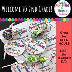 some lollipops are sitting on top of a white paper with the words welcome to 2nd grade