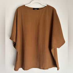 Brand: Cider Color: Ginger Size: 1xl Sleeve Type: Short Material: 95% Polyester 5% Spandex Nwt Oversized Brown Cotton Blouse, Oversized Brown Blouse For Summer, Brown Relaxed Fit Crew Neck Blouse, Oversized Brown Summer Tops, Oversized Short Sleeve Brown Blouse, Brown Oversized Short Sleeve Blouse, Oversized Brown Blouse With Short Sleeves, Cider Tops, Ginger Color