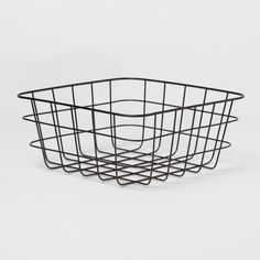 a black wire basket on a white background