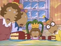 the family is eating cake at the table