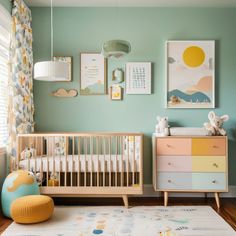 a baby's room with blue walls and yellow accents