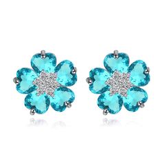 PRICES MAY VARY. BRIGHTEN YOUR LADY'S DAY: If you are looking for a unique way to say "I love you " or "You are my everything ", the Crystalline Azuria women's earrings will say it for you in the most adorable way. HEAD-TURNING BLUE EARRINGS: Our small womens Flowers Stud Earrings 18k white gold plated earrings feature eye-catching Blue Simulated Aquamarine Zirconia Crystals, imitation gemstones. DAZZLE WITH A MEANINGFUL GIFT: The luxurious presentation box and certificate of authenticity will m Pretend Jewelry, Cartilage Earrings Stud, Womens Earrings Studs, Stud Earrings For Women, Swarovski Earrings, Flower Earrings Studs, Stud Earrings Set, Online Earrings, Blue Earrings