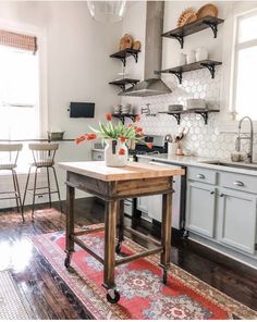 the kitchen is clean and ready to be used as a dining room or office space