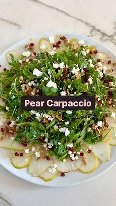 pear and arugula salad with feta cheese on top