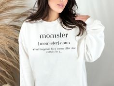 "Celebrate Mother's Day in style with our \"Momster\" sweater! Made from soft and cozy materials, this sweater is perfect for any mom looking to show off her fun and playful side. The sweater features a classic fit with long sleeves and a crew neckline, making it a comfortable and versatile addition to any wardrobe. This sweater is the perfect gift for any mom on Mother's Day or any other occasion. It can be dressed up or down, worn with jeans or leggings, and layered with a jacket or scarf for Long Sleeve Tops For Mother's Day Loungewear, Mother's Day Casual Long Sleeve Sweatshirt, Casual Long Sleeve Sweatshirt For Mother's Day, Being A Mom, Women Pullover, Sew-in Labels, Running Errands, Crew Neckline, San Jose