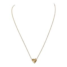 Totally chic and on trend, this necklace is the perfect every day heart with a diamond in the middle to elevate it just the right amount. Shown here at 18 inches but can be worn higher at 16 or 17 inches as well.  N/A; 16-18 inches  Exact dimensions are unknown. Please reach out in the seller Q&A for any questions on measurements. Elegant Heart Pendant Charm Necklace, Elegant Pendant Charm Necklace With Heart Detail, Wedding Heart Pendant Necklace With Diamond Cut, Wedding Diamond Cut Heart Pendant Necklace, Gold Heart Necklace With Single Cut Diamonds, Elegant Yellow Gold Charm Necklace With Heart Beads, Elegant Yellow Gold Charm Necklaces With Heart Beads, Luxury Diamond Cut Heart Pendant Necklace, Luxury Heart Shaped Necklace For Formal Occasions