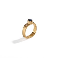 22K yellow gold, cobalt blue spinel .72cts total weight, 2 champagne diamonds • Size 6.75 (51.21 mm) inside circumference • 0.18" (4.57mm) band width • 0.27" (6.86mm) length of stone • 0.23" (5.84mm) width of stone • One of a kind Anniversary Gold Sapphire Ring With Tension Setting, Gold Sapphire Ring With Tension Setting For Wedding, Oval Yellow Gold Sapphire Ring With Single Cut Diamonds, Timeless Gold Sapphire Ring With Tension Setting, Yellow Gold Sapphire Ring With Tension Setting For Wedding, Gold Sapphire Ring With Oval Tension Setting, Gold Sapphire Ring With Tension Setting And Oval Shape, Gold Sapphire Ring With Tension Setting For Promise, Anniversary Yellow Sapphire Ring In Yellow Gold