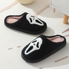 The best slippers for any horror movie fan. Fluffy cotton plush slippers with embroidered white mask in a sea of black fluff. Slip on/off for easy wear. Non-slip soles. Available in Women's sizes 6-11. Fit note: these slippers run about a half size small, We recommend ordering a size up from your usual, for optimal comfort. See foot measurement listed in cm next to slipper size. Good things take time. These shoes are made to order and ship from our overseas warehouse and will arrive in your mailbox in 7-12 business days. Skull Cartoon, Couple Home, Indoor Outdoor Slippers, Slippers For Men, Red Skull, Winter Slippers, Suede Slippers, Fuzzy Slippers, Warm Slippers