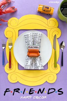 a plate with a hot dog on it next to some forks and spoons in front of a purple background