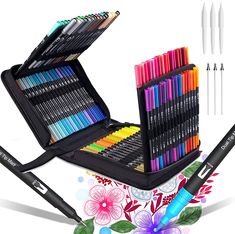 an open case filled with markers and pencils next to some pens on a white background