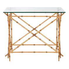 a glass topped table with bamboo legs