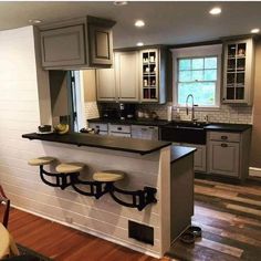 the kitchen is clean and ready to be used as a dining room or living room