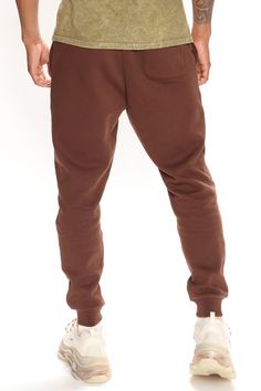 Available In Black, Grey, White, Navy, And Red Elastic Waist With Drawstring Side Hand Pockets Back Patch Pocket Ribbed Cuff At Bottom Of Leg 80% Cotton 20% Polyester Imported | Mens Tyson Jogger Pant in Chocolate Brown size Medium by Fashion Nova Stretch Brown Sweatpants With Pockets, Brown Stretch Sweatpants With Pockets, Casual Brown Bottoms With Comfort Waistband, Fitted Cotton Sweatpants With Pockets, Stretch Cotton Brown Bottoms, Stretch Brown Cotton Bottoms, Brown Stretch Cotton Sweatpants, Brown Cotton Joggers For Loungewear, Fitted Brown Cotton Bottoms