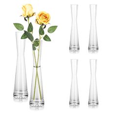 four vases with yellow roses in them on a white background and one is empty