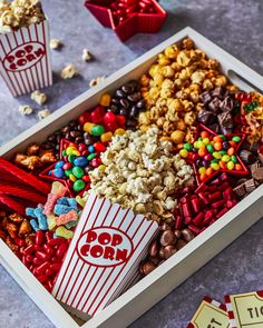 a box filled with lots of candy and popcorn