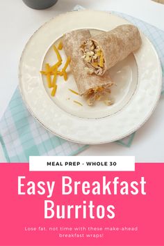 an easy breakfast burrito on a plate