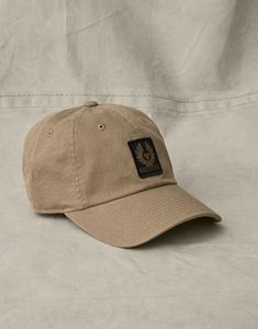 Phoenix Logo Cap in Khaki | Men Hats And Scarves | Belstaff US Adjustable Logo Baseball Cap For Outdoor, Adjustable Outdoor Baseball Cap With Logo, Casual Six-panel Hat With Logo, Casual Cotton Dad Hat With Logo, Casual Dad Hat With Logo And Curved Bill, Casual Adjustable Dad Hat With Logo, Six-panel Baseball Hat With Logo Patch, Baseball Season Cap With Curved Visor And Logo Patch, Casual Trucker Hat With Logo Patch