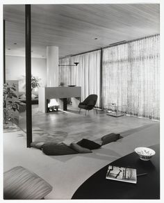 a black and white photo of a living room