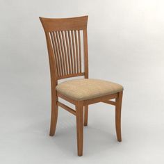 a wooden chair sitting on top of a white floor