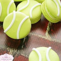 green and white tennis ball cookies on a table