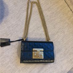 Gucci Padlock Shoulder Bag Guccissima Leather Medium Purchased A Few Years Ago. In Great Used Condition. Leather Has No Scratches Or Flaws But Gold Area Where Purse Closes Has A Few Scratches Only Visible When Light In Shined On It (See Picture With And Without Flash). Luxury Gold Shoulder Bag With Lock, Designer Wallet On Chain With Gold-tone Hardware, Designer Rectangular Shoulder Bag With Lock, Designer Wallet On Chain With Branded Hardware, Luxury Wallet On Chain With Branded Hardware For Travel, Luxury Travel Wallet On Chain With Branded Hardware, Luxury Gold Wallet On Chain With Branded Hardware, Designer Crossbody Wallet On Chain With Branded Hardware, Designer Wallet On Chain For Everyday Use